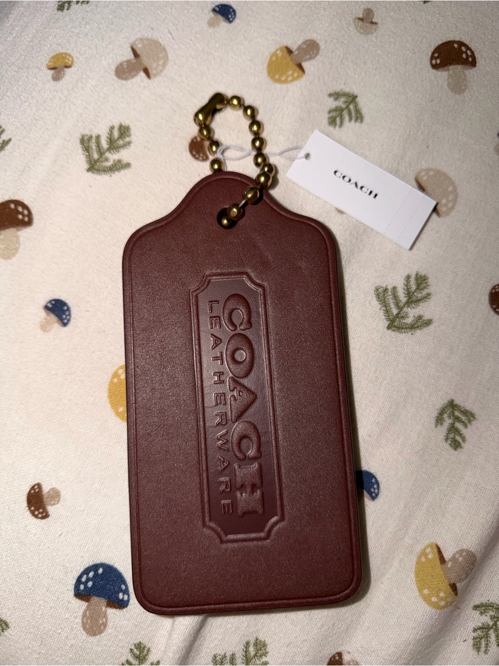 Coach XXL maple hangtag